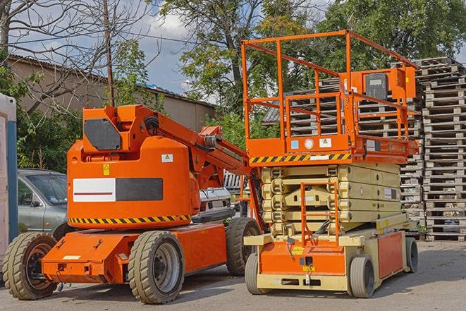 warehouse forklift in operation with stacked inventory in Brownsville